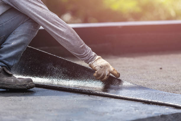 Professional Waterproofing technician working in Southgate, KY